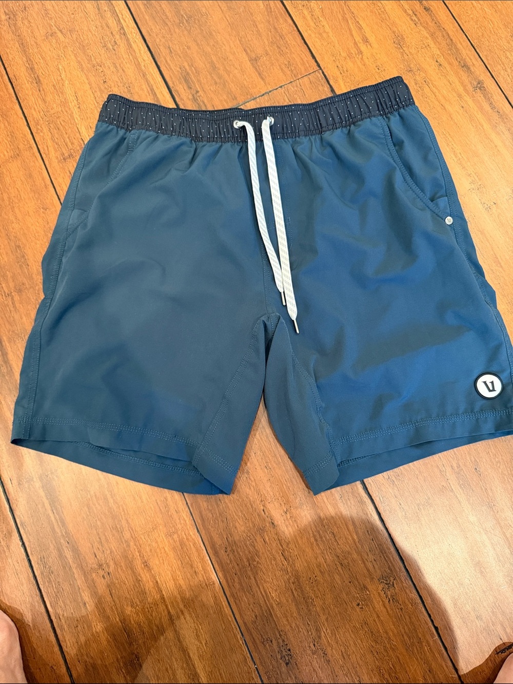 Vuori Teal Athletic Shorts with Navy Waistband and White Drawcord